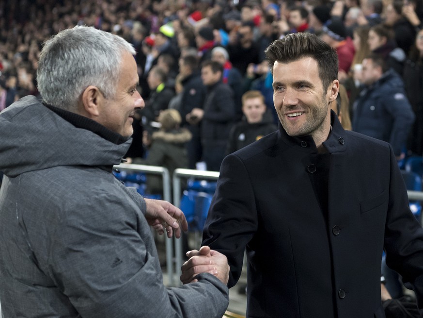 Manchester United&#039;s head coach Jose Mourinho, left, and Basel&#039;s head coach Raphael Wicky, right, shake hands prior to the UEFA Champions League Group stage Group A matchday 5 soccer match be ...