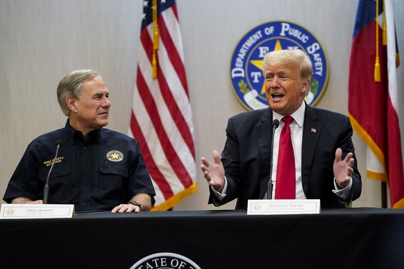 Texas Gov. Greg Abbott and former President Donald Trump attend a briefing with state officials and law enforcement at the Weslaco Department of Public Safety DPS Headquarters before touring the US-Me ...