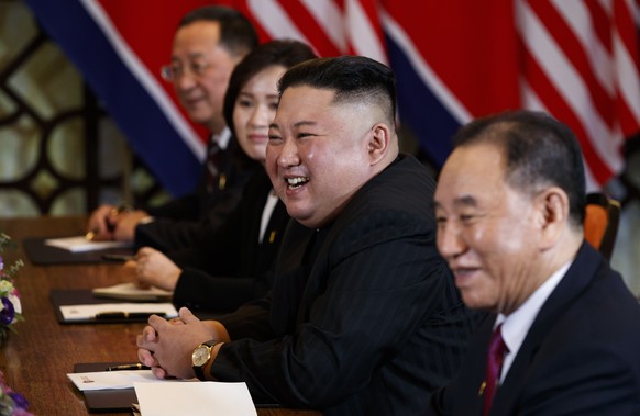 FILE - In this Feb. 28, 2019, file photo, North Korean leader Kim Jong Un smiles during a meeting with President Donald Trump, Thursday, Feb. 28, 2019, in Hanoi. at right is Kim Yong Chol, a North Kor ...