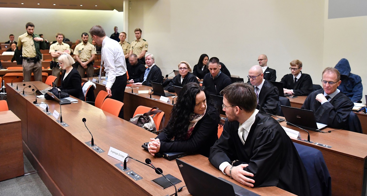 epa06355059 Co-defendant Beate Zschaepe, her lawyer Mathias Grasel (1st row R), and co-defendants Ralf Wohlleben (2nd row C) and Andre E. (2nd row L) and Carsten S. (3rd row R) wait for the start of t ...