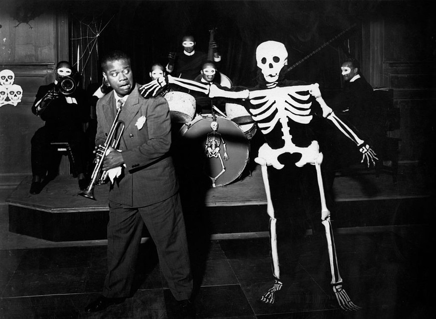 Louis Armstrong is frightened by a skeleton during the song &quot;Skeleton in the Closet&quot;, from the movie Pennies from Heaven. (Photo by �� John Springer Collection/CORBIS/Corbis via Getty Images ...