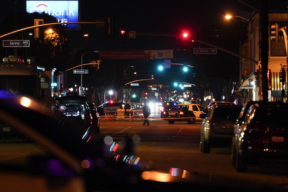 Police are investigating a scene where a shooting occurred in Monterey Park, California, Sunday, January 22, 2023. Dozens of police officers responded to reports of a shooting that occurred after a large Lunar N...