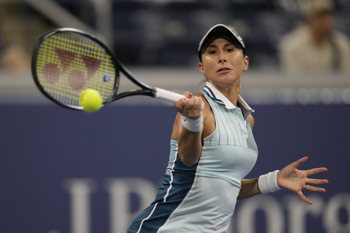 Belinda Bencic, of Switzerland, returns a shot to Zhu Lin, of China, during the third round of the U.S. Open tennis championships, Friday, Sept. 1, 2023, in New York. (AP Photo/Charles Krupa)