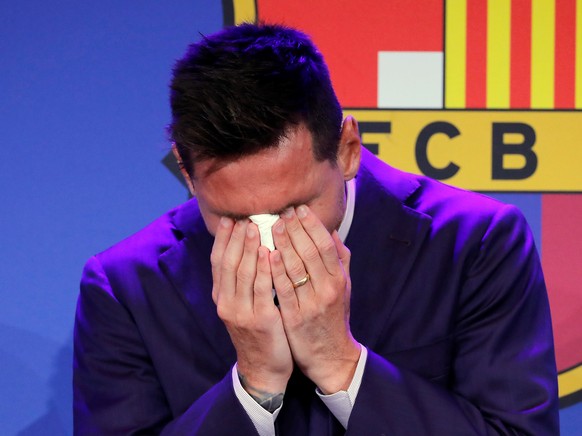 epaselect epa09405792 Argentine forward Lionel Messi gets emotional during a press conference to explain his version of the reasons for his departure from Barcelona FC in Barcelona, Spain, 08 August 2 ...