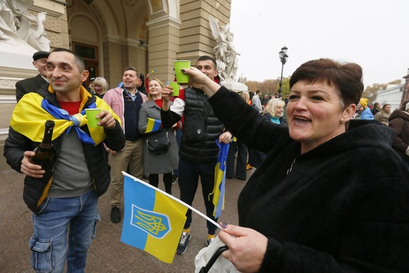 Kherson Residents Celebrate The Liberation Of Their Native Town In Odesa City, Amid Russia s Invasion Of Ukraine Kherson residents temporarily living in Odesa holding national flags and placards celeb ...