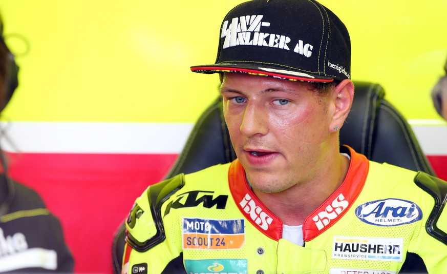 epa06972426 South African Swiss Moto2 rider Dominique Aegerter of the Kiefer Racing Team in the pits during the Moto2 practice session of the 2018 Motorcycling Grand Prix of Britain at the Silverstone ...