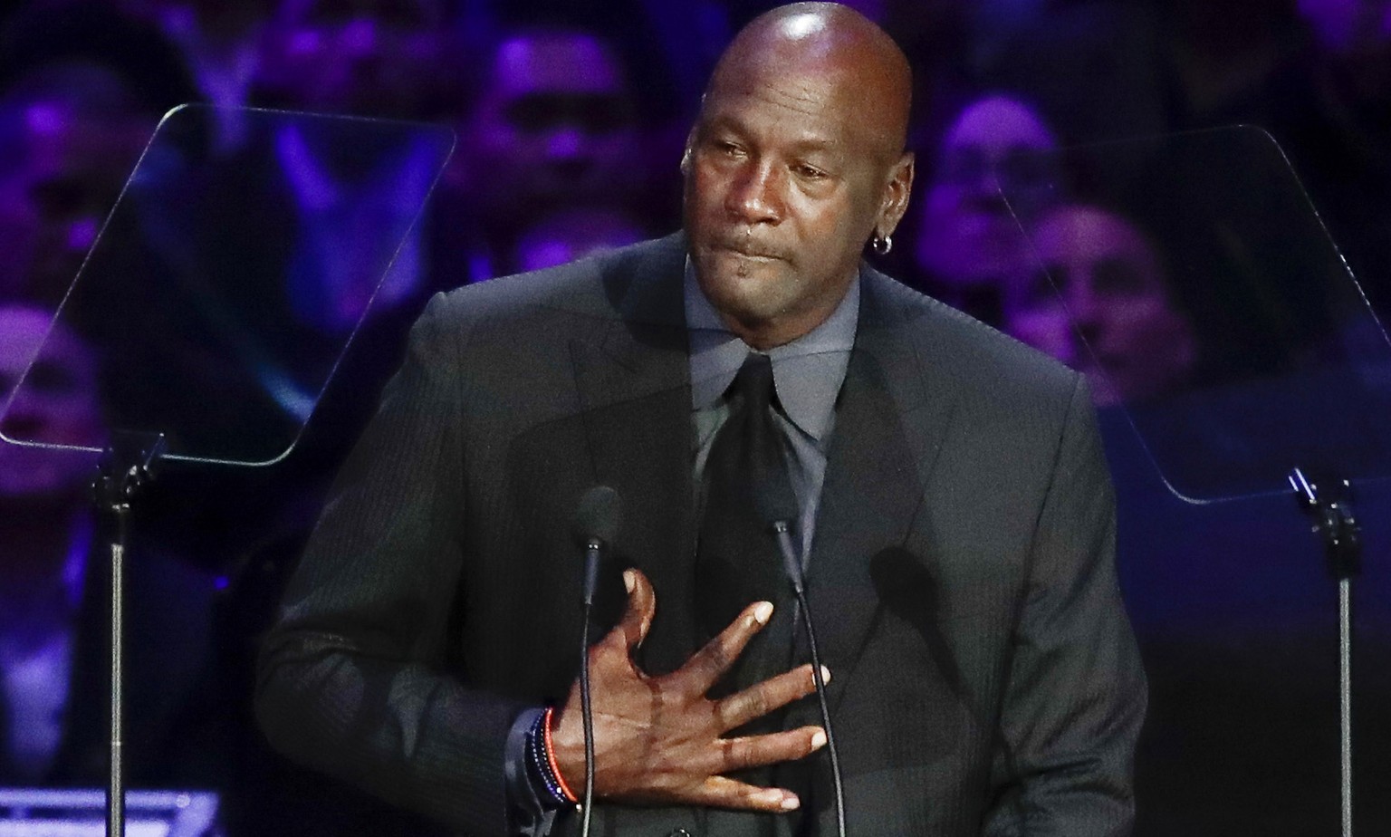 FILE - In this Feb. 24, 2020, file photo, former NBA player Michael Jordan reacts while speaking during a celebration of life for Kobe Bryant and his daughter Gianna in Los Angeles. Jordan is &quot;de ...