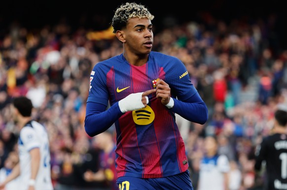 Barcelona&#039;s Lamine Yamal celebrates after scoring his side&#039;s first goal during a Spanish La Liga soccer match between Barcelona and Alaves, in Barcelona, Spain, Saturday, Nov. 29, 2025. (AP  ...