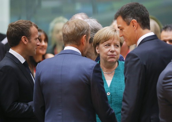 epa06847423 (L-R) French President Emmanuel Macron, European Council President Donald Tusk and German Chancellor Angela Merkel and Spanish Prime Minister Pedro Sanchez during an European Council summi ...