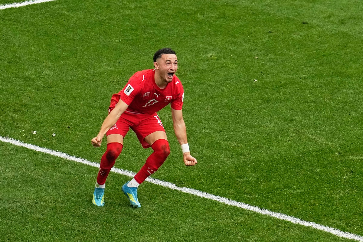 Switzerland's Ruben Vargas (17) reacts after scoring the winning penalty shot in a shootout against Colombia during the World Cup round of 16 soccer match in Vancouver, British Columbia, Tuesday, ...
