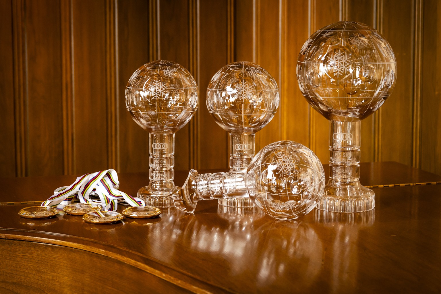 The men's World Cup overall crystal globe trophy, the men's Downhill discipline leader crystal globe trophy, the men's Super-g discipline leader crystal globe trophy and the men's  ...