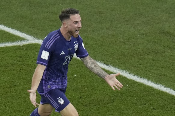 Argentina&#039;s Alexis Mac Allister celebrates after scoring his side&#039;s opening goal during the World Cup group C soccer match between Poland and Argentina at the Stadium 974 in Doha, Qatar, Wed ...