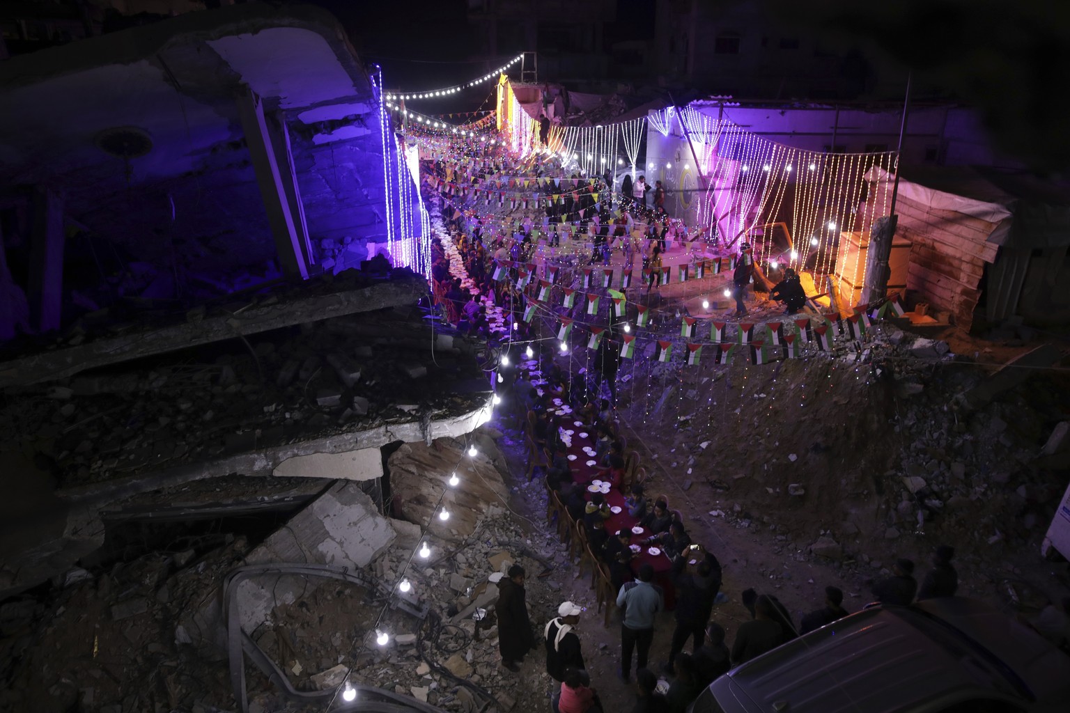 Palestinians hang decorations next to their destroyed homes in preparation for the holy month of Ramadan in Khan Younis, southern Gaza Strip, Friday, Feb. 28, 2025. (AP Photo/Jehad Alshrafi)
Mideast R ...