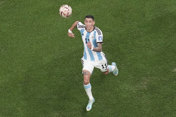 Argentina&#039;s Angel Di Maria controls the ball during the World Cup final soccer match between Argentina and France at the Lusail Stadium in Lusail, Qatar, Sunday, Dec. 18, 2022. (AP Photo/Thanassi ...