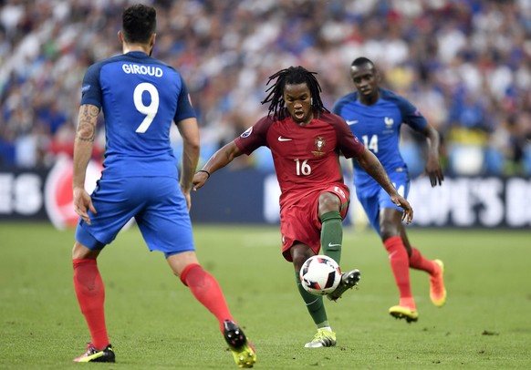 Portugal&#039;s Renato Sanches, center, controls the ball during the Euro 2016 final soccer match between Portugal and France at the Stade de France in Saint-Denis, north of Paris, Sunday, July 10, 20 ...