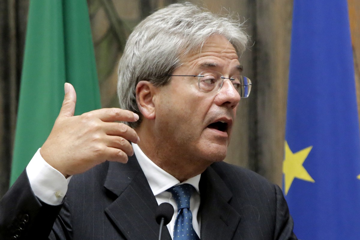 Italy's Foreign Minister Paolo Gentiloni talks to the media during a press conference after a meeting with his Cyprus' counterpart Ioannis Kasoulides at the foreign house in capital Nicosia, ...