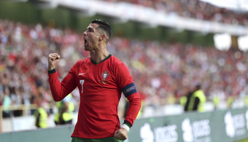 Portugal&#039;s Cristiano Ronaldo celebrates after scoring against Ireland during a friendly soccer match between Portugal and Ireland at the Aveiro Municipal stadium in Aveiro, Portugal, Tuesday, Jun ...