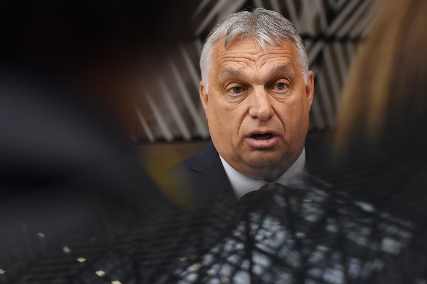 Hungarian Prime Minister Viktor Orban speaks to media prior the extraordinary meeting of EU leaders to discuss Ukraine, energy and food security at the Europa building in Brussels, Monday, May 30, 202 ...