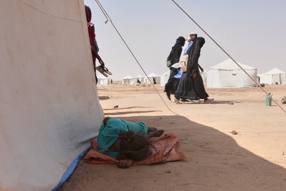 People displaced from North Darfur&#039;s capital, el-Fasher and other conflict-affected areas settle in the newly established El-Afadh camp in Al Dabbah, in Sudan&#039;s Northern State, Sudan, Thursd ...