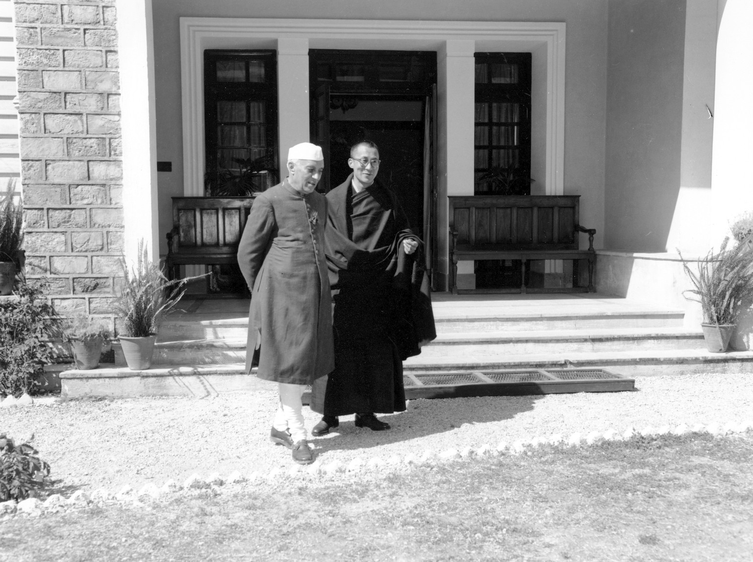 FILE - Indian Prime Minister Jawaharlal Nehru, left, visits the Dalai Lama, spiritual and temporal head of Tibet, at Birla House in the hill station of Mussoorie, India on April 24, 1959. The Dalai La ...