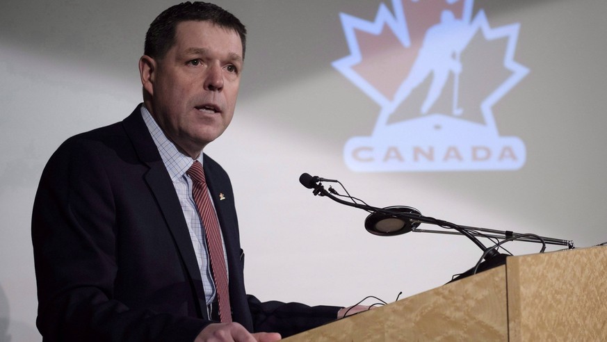 December 6, 2017, Calgary, ab, Canada: Hockey Canada president and CEO Scott Smith announces the players invited to Canada s National Junior Team selection camp during a news conference in Calgary, Al ...