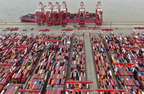 FILE - In this July 10, 2021, file photo, the Yangshan container port is seen in an aerial view in Shanghai, China. China has applied to join an 11-nation Asia-Pacific free trade group in an effort to ...