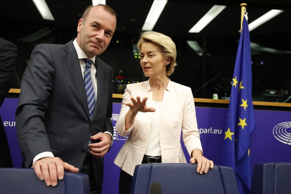 Germany&#039;s Ursula von der Leyen and Germany&#039;s Manfred Weber arrive for a joint press conference at the European Parliament in Strasbourg, eastern France, Wednesday July 3, 2019. On Tuesday, E ...