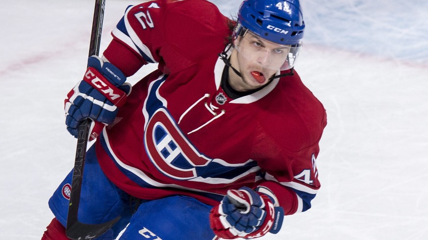 Montreal Canadiens&#039; Sven Andrighetto celebrates his goal past Carolina Hurricanes goalie Cam Ward in a shootout to win 2-1 an NHL hockey game Sunday, Feb. 7, 2016, in Montreal. (Paul Chiasson/The ...