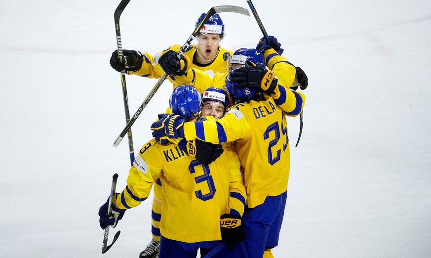 epa06749928 John Klingberg of Sweden celebrates a score during the IIHF World Championship semi final ice hockey match between Sweden and USA at Royal Arena in Copenhagen, Denmark, 19 May 2018. EPA/LI ...