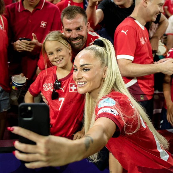 Geneva, Switzerland, July 10th 2025: Alisha Lehmann 23 Switzerland with fans after the UEFA Womens EURO 2025 Group A match between Finland and Switzerland at Stade de Geneve in Geneva, Switzerland. Pe ...