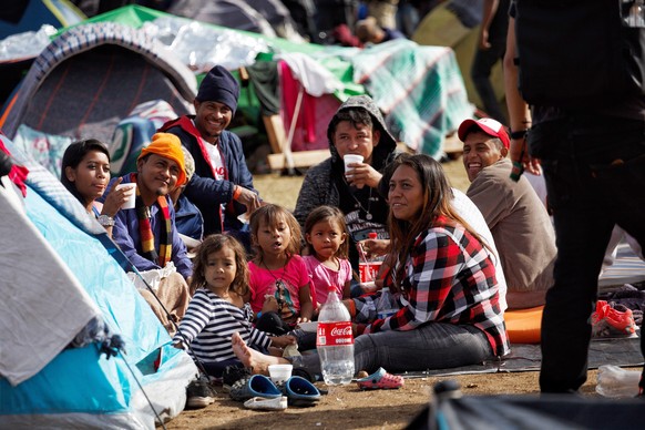 epa07183441 Central American migrants remain in a shelter at the Sports Center Benito Juarez, in Tijuana, Mexico, 22 November 2018. Dozens of Central Americans from the migrant caravan are faced with  ...