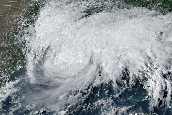 This GOES-16 GeoColor satellite image taken at 4:01 p.m. EDT and provided by National Oceanic and Atmospheric Administration (NOAA) shows Tropical Storm Francine as it approaches landfall over Louisia ...
