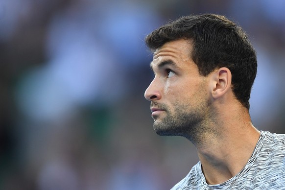 epa05753602 Grigor Dimitrov of Bulgaria reacts during his Men&#039;s Singles semifinal match against Rafael Nadal of Spain at the Australian Open Grand Slam tennis tournament in Melbourne, Australia,  ...