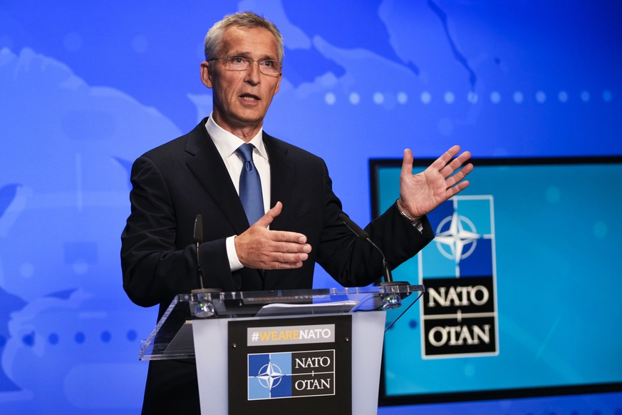FILE - In this Friday, Aug. 20, 2021 file photo, NATO Secretary General Jens Stoltenberg gestures during an online news conference at NATO headquarters in Brussels. NATO Secretary-General Jens Stolten ...