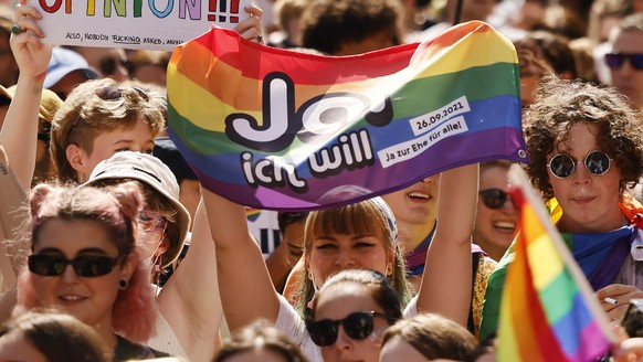 People demonstrate at the Zurich Pride parade in Zurich, Switzerland, with the slogan &quot;Dare. Marriage for all, now!&quot; (Trau Dich. Ehe fuer alle. Jetzt!) for the rights of the LGBTIQ community ...