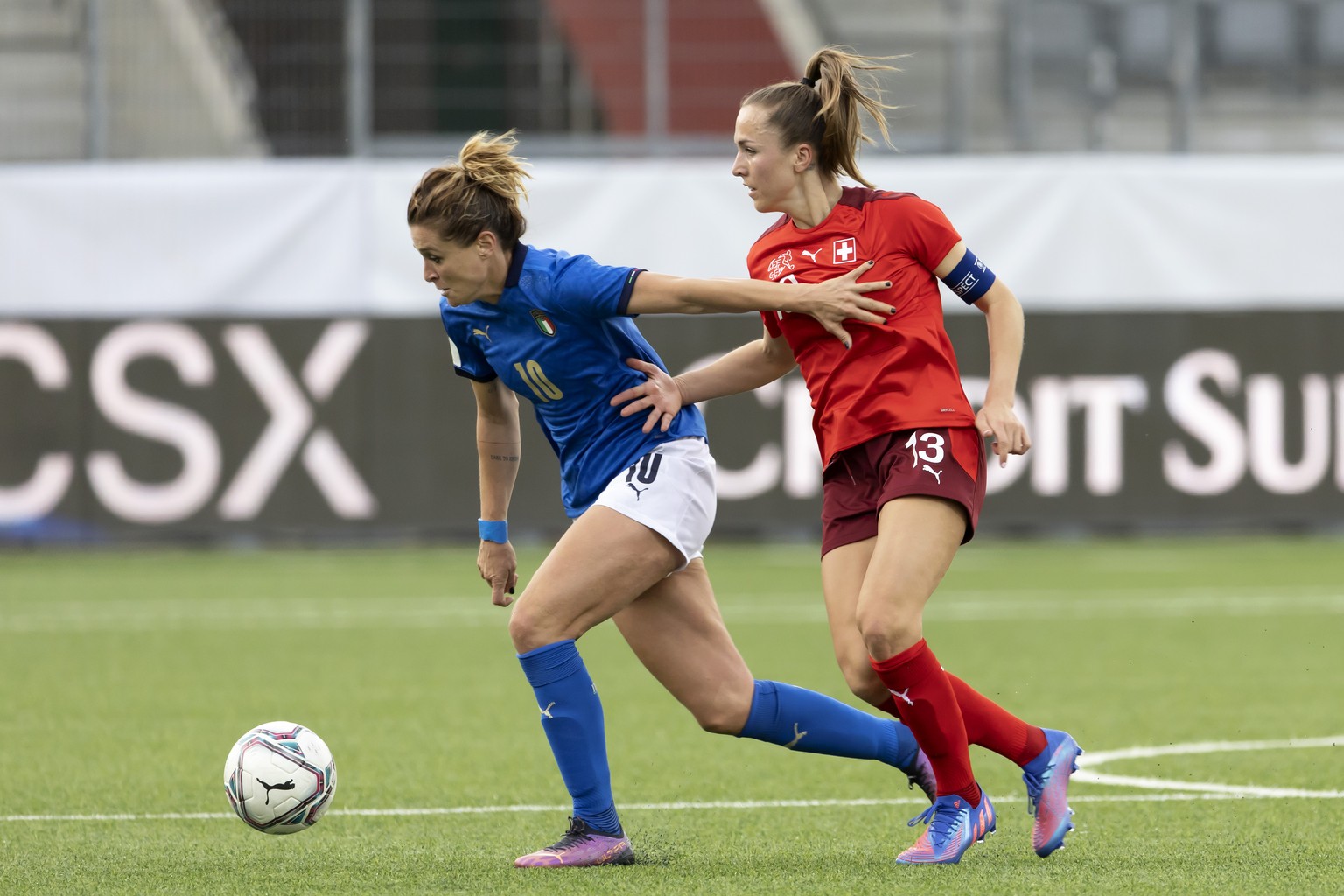 Italy&#039;s forward Cristiana Girelli, left, fights for the ball with Switzerland&#039;s midfielder Lia Waelti, right, during the FIFA Women&#039;s World Cup 2023 qualifying round group G soccer matc ...