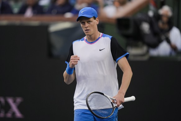 Jannik Sinner, of Italy, reacts after winning a game against Carlos Alcaraz, of Spain, during a semifinal at the BNP Paribas Open tennis tournament in Indian Wells, Calif., Saturday, March 16, 2024. ( ...