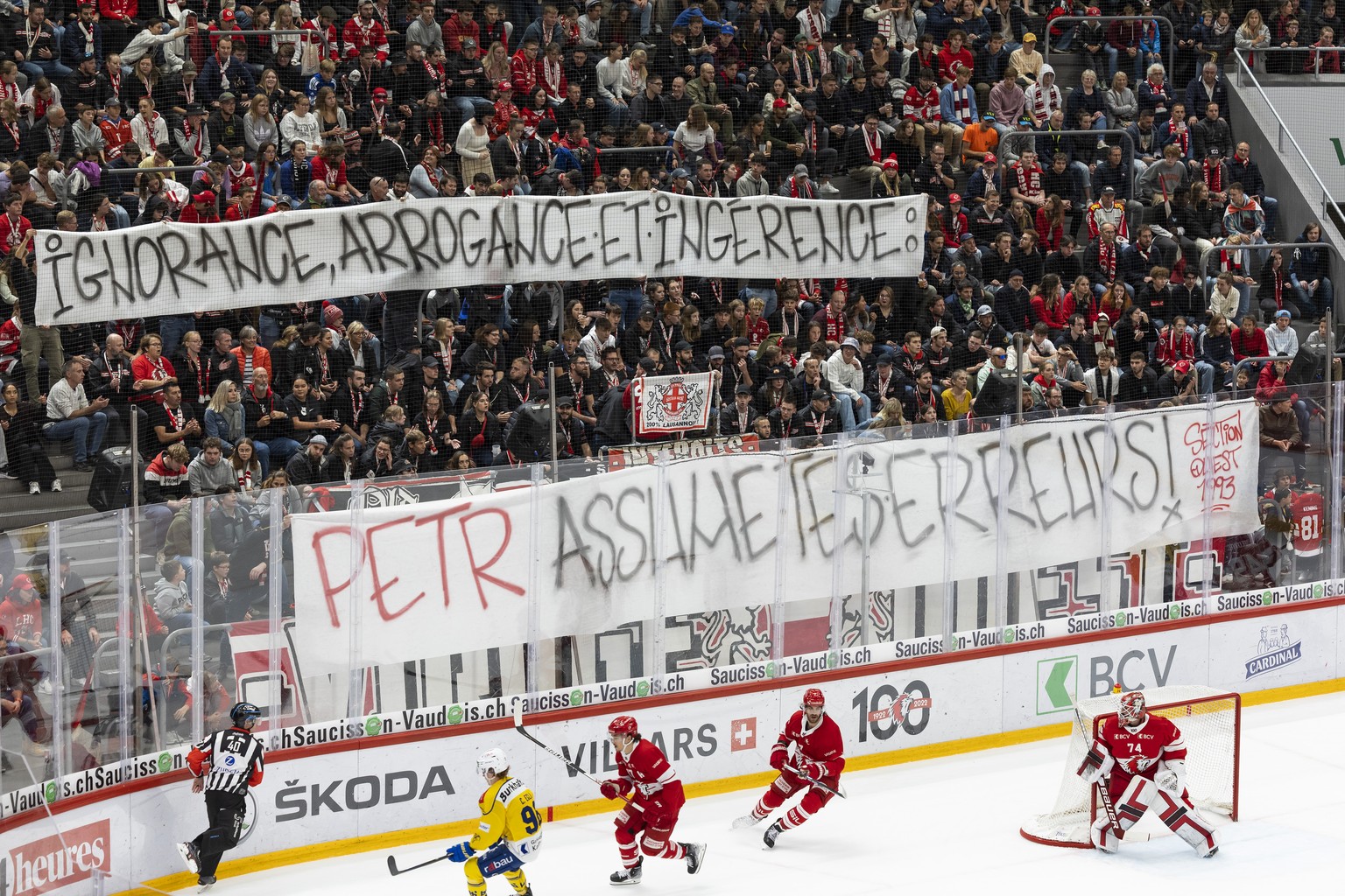 Supporters show a banner against Petr Svoboda, Director of hockey operations of the Lausanne Hockey Club, during a National League regular season game of the Swiss Championship between Lausanne HC and ...