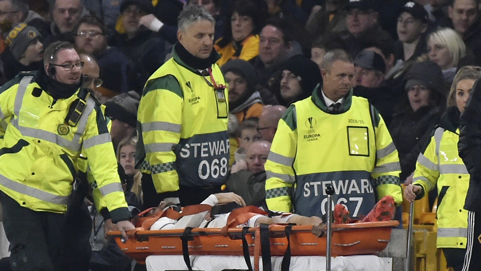 Slovan Bratislava&#039;s Kenan Bajric is carried from the pitch after injuring during the Europa League group K soccer match between Wolverhampton Wanderers and Slovan Bratislava at the Molineux Stadi ...