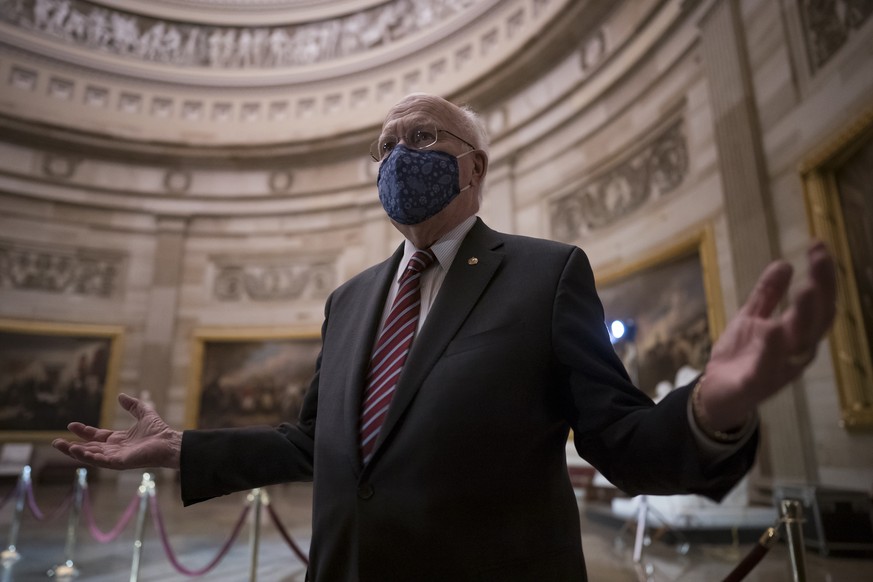 epa08965486 Sen. Patrick Leahy, D-Vt., the new president pro tempore of the Senate, pauses in the Rotunda of the Capitol before the article of impeachment against former President Donald Trump is deli ...