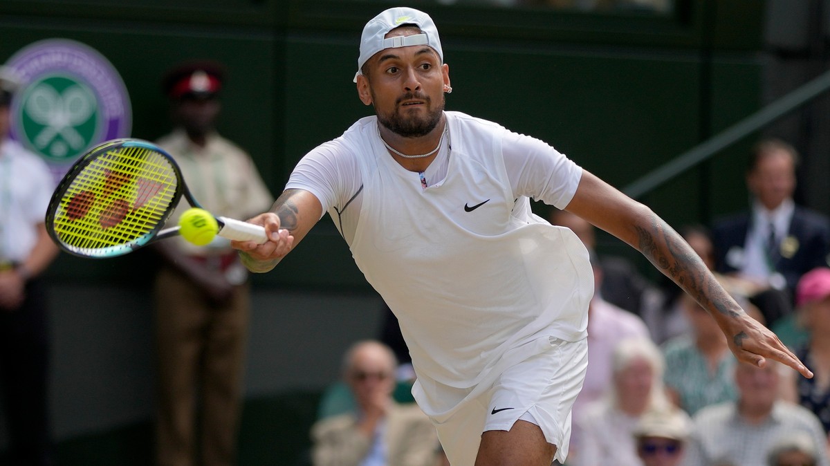 FILE - Australia's Nick Kyrgios returns to Serbia's Novak Djokovic in the final of the men's singles during the Wimbledon tennis championships in London, July 10, 2022. (AP Photo/Alasta ...