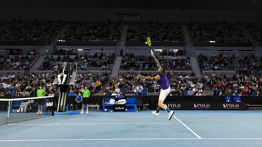 epa09006277 Spectators watch Nick Kyrgios of Australia during his third Round Men&#039;s singles match against Dominic Thiem of Austria on Day 5 of the Australian Open at Melbourne Park in Melbourne,  ...