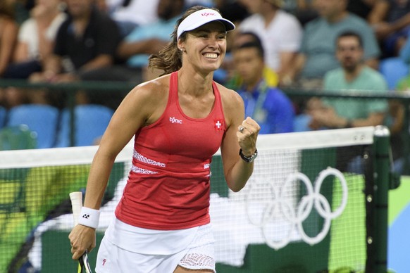 epa05460609 Martina Hingis of Switzerland celebrates winning against Daria Gavrilova and Samantha Stosur from Australia after the women&#039;s first round doubles match of the Rio 2016 Olympic Games T ...