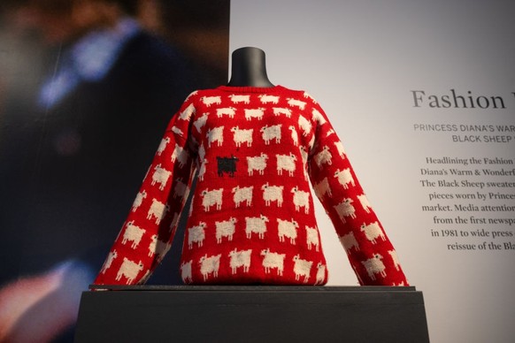 NEW YORK, NEW YORK - SEPTEMBER 07: Princess Diana's Black Sheep Sweater is on display on his first day in New York at Sotheby's on September 7, 2023 in New York City.  The sweater was original...