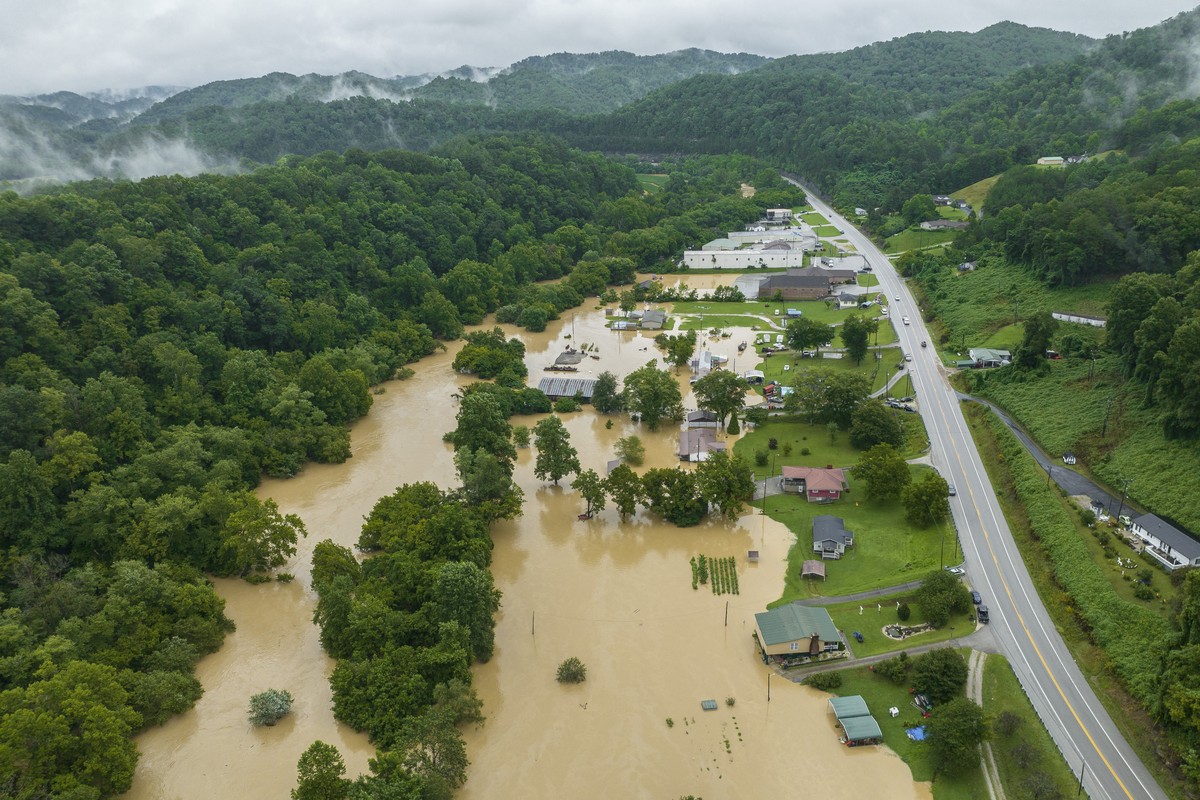 Home and structures are flooded near Quicksand, Ky., Thursday, July 28, 2022. Heavy rains have caused flash flooding and mudslides as storms pound parts of central Appalachia. Kentucky Gov. Andy Beshe ...