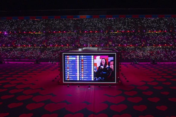 Switzerland during the scoring by anchorman Sven Epiney in the Arena Plus a public viewing in St. Jakob Park, during the grand-final at the 69th Eurovision Song Contest in Basel, Switzerland, on Satur ...