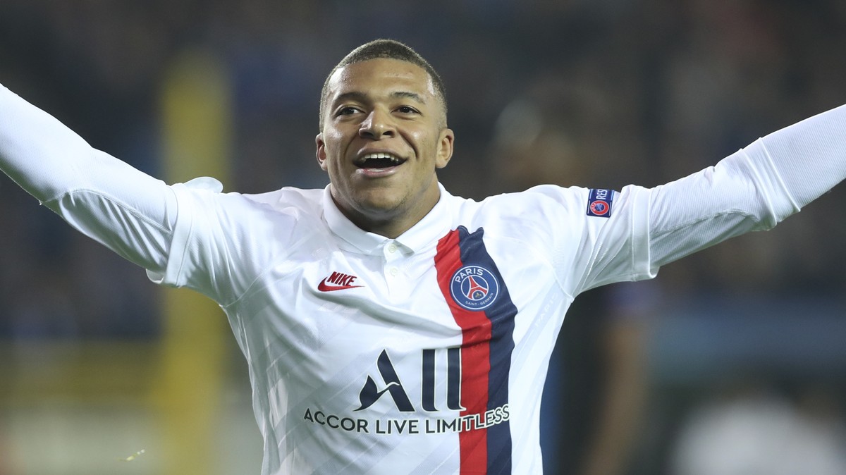 PSG's Kylian Mbappe jubilates after scoring during a Champions League Group A soccer match between Club Brugge and Paris Saint Germain at the Jan Breydel stadium in Bruges, Belgium, Tuesday, Oct. ...