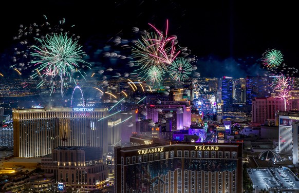 Fireworks explode over the Strip during New Year&#039;s Eve celebrations on Saturday, Jan. 1, 2022, in Las Vegas. (L.E. Baskow/Las Vegas Review-Journal via AP)