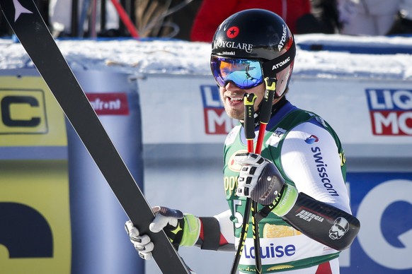 Switzerland&#039;s Mauro Caviezel reacts in the finish area following his run in the men&#039;s World Cup super-G ski race in Lake Louise, Alberta, on Sunday, Dec. 1, 2019. (Jeff McIntosh/The Canadian ...