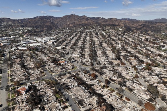 FILE - The devastation from the Palisades Fire is shown in an aerial view in the Pacific Palisades neighborhood of Los Angeles, Monday, Jan. 27, 2025. (AP Photo/Jae C. Hong, File)
California Wildfires ...